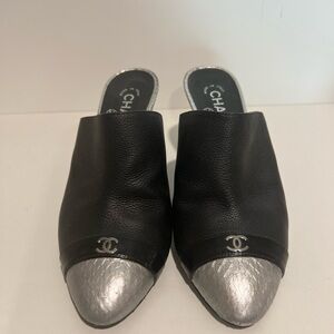 CHANEL Black Leather Mules with Silver Cap Toe